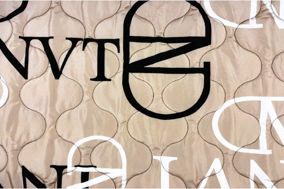 Matelassé beige foncé noir