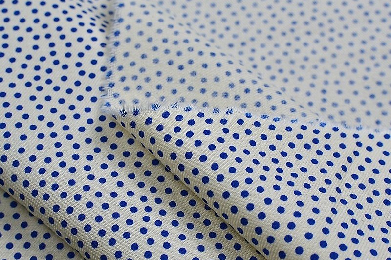 Coton pois bleus fond écru