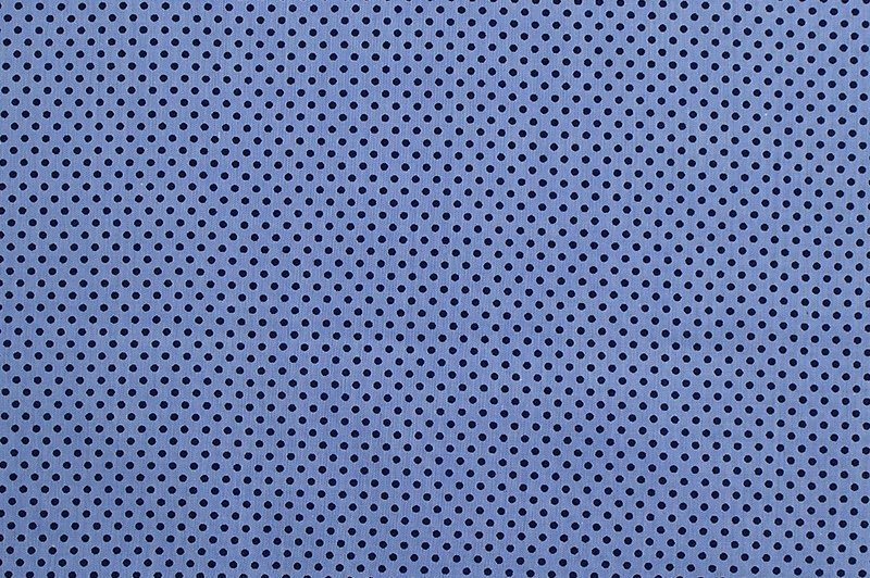 Coton peigné à pois sur fond bleu